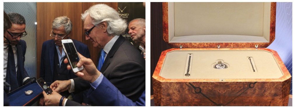 Cellulari all'opera nella boutique e il cofanetto in radica